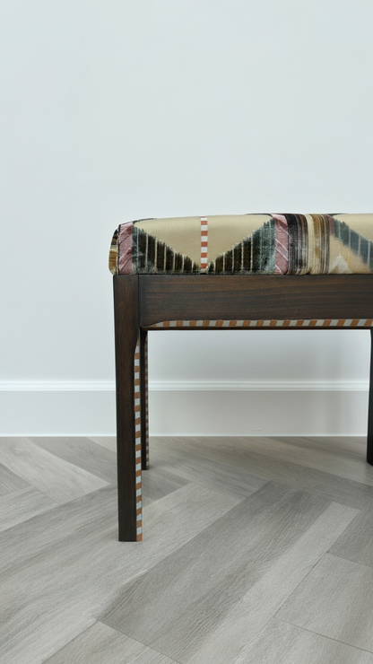 Decorative bench with patterned cushion 