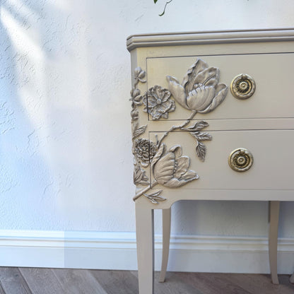 Hand applied resin floral details